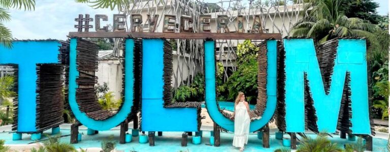 huge blue letters that spell tulum and me in front