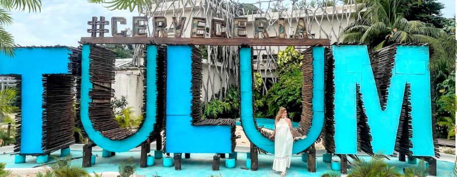 huge blue letters that spell tulum and me in front