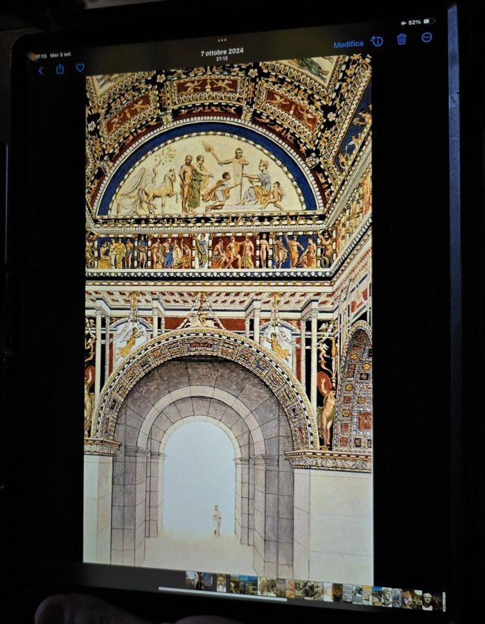 A detailed depiction of a classical architectural design displayed on a tablet, featuring ornate decorations and figures within an archway.