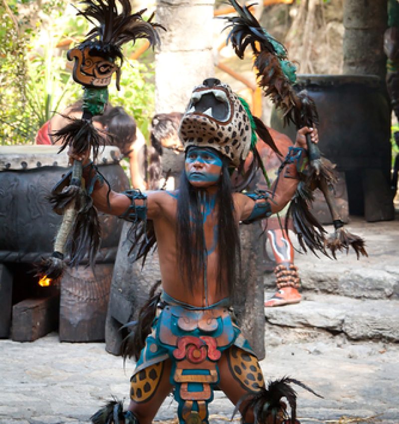 A vibrant reenactment of ancient Mayan traditions comes to life at Xcaret Park, where performers in full warrior attire share Mexico’s indigenous history through powerful rituals and storytelling.